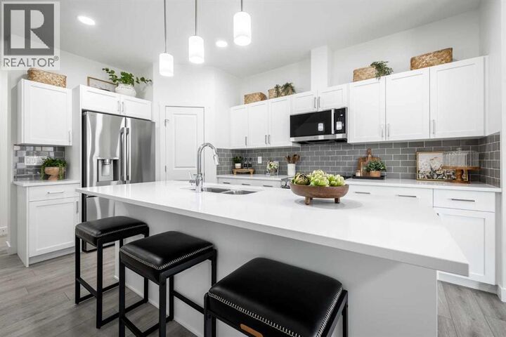 Property Photo:  304 Heritage Boulevard  AB T4C 3K6 