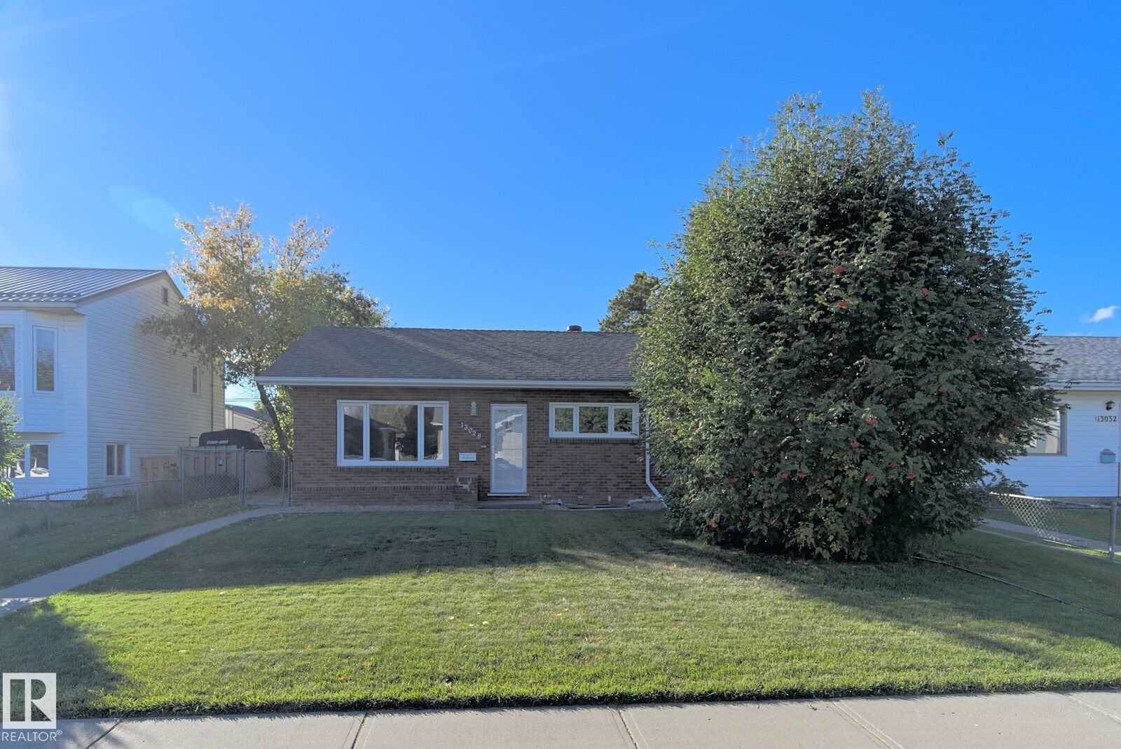 Property Photo:  13028 134 Street NW  AB T5L 1V8 