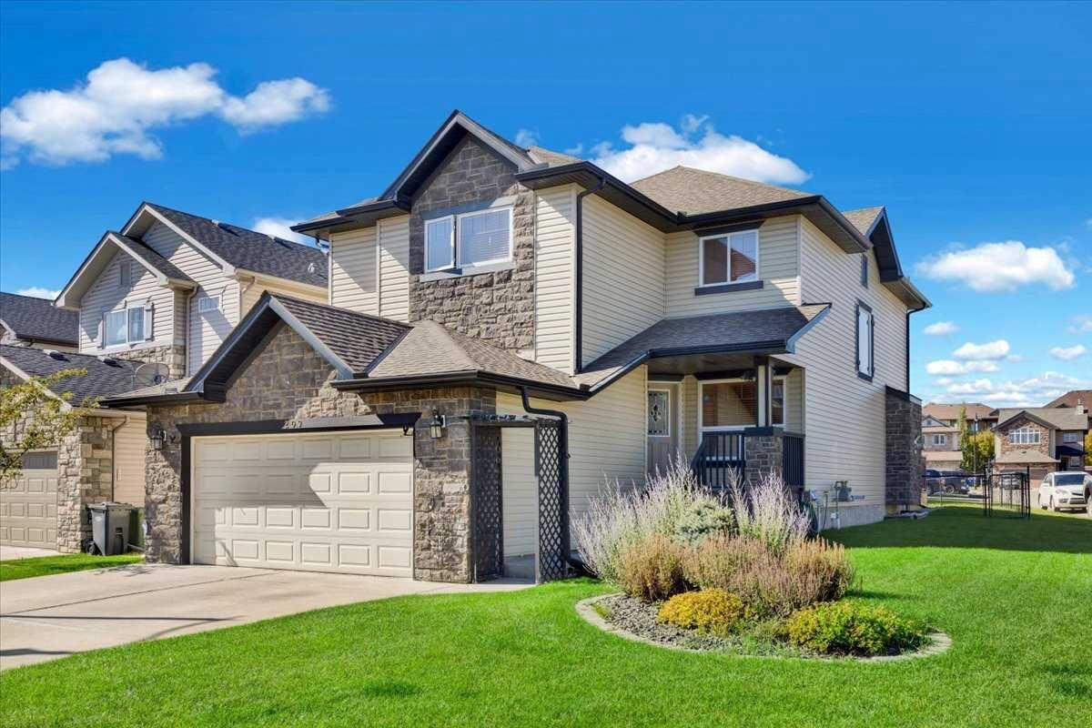 Property Photo:  209 Crystal Green Point  AB T1S 2K7 