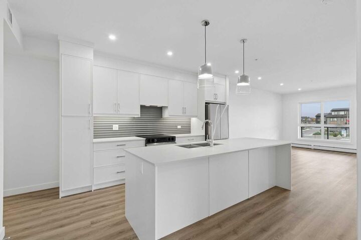 Property Photo:  1802 Mahogany Boulevard SE 6320  AB T3M 4A5 
