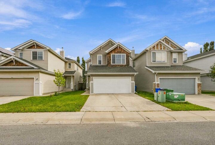Property Photo:  16 Cougartown Place SW  AB T3H 0A2 