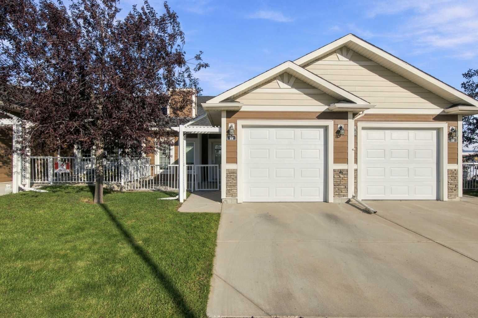 Property Photo:  36 Sunrise Place NE  AB T1V 0G9 