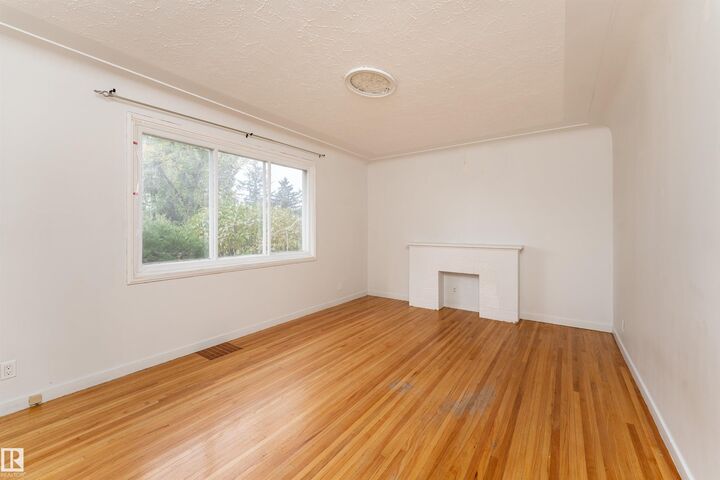 Property Photo: 10719 132 Street NW AB T5M 1C8