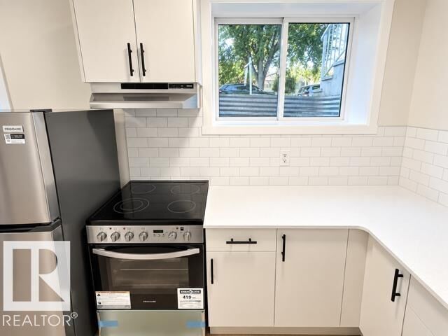 Property Photo:  12038 62 Street NW Bsmt  AB T5W 4C8 