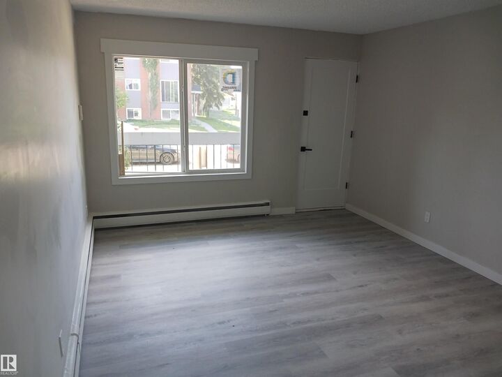 Property Photo:  10045 154 Street NW 1  AB T5P 2H1 