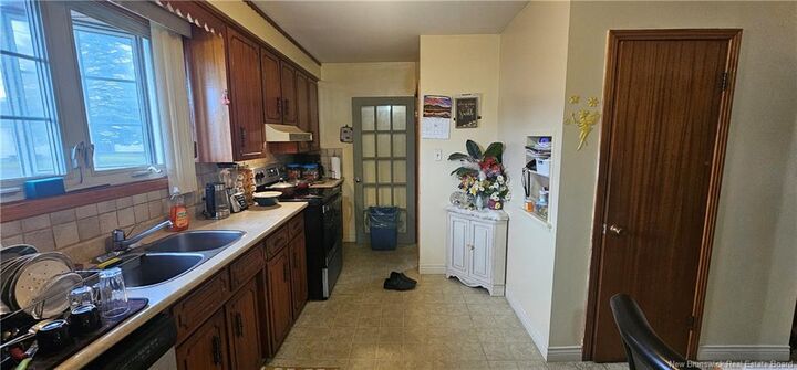 Property Photo:  118 Spruce Street  NB E1C 7K3 