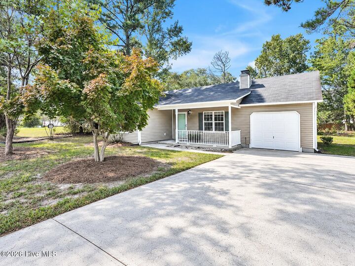 Property Photo:  303 E Wood Lane  NC 28451 