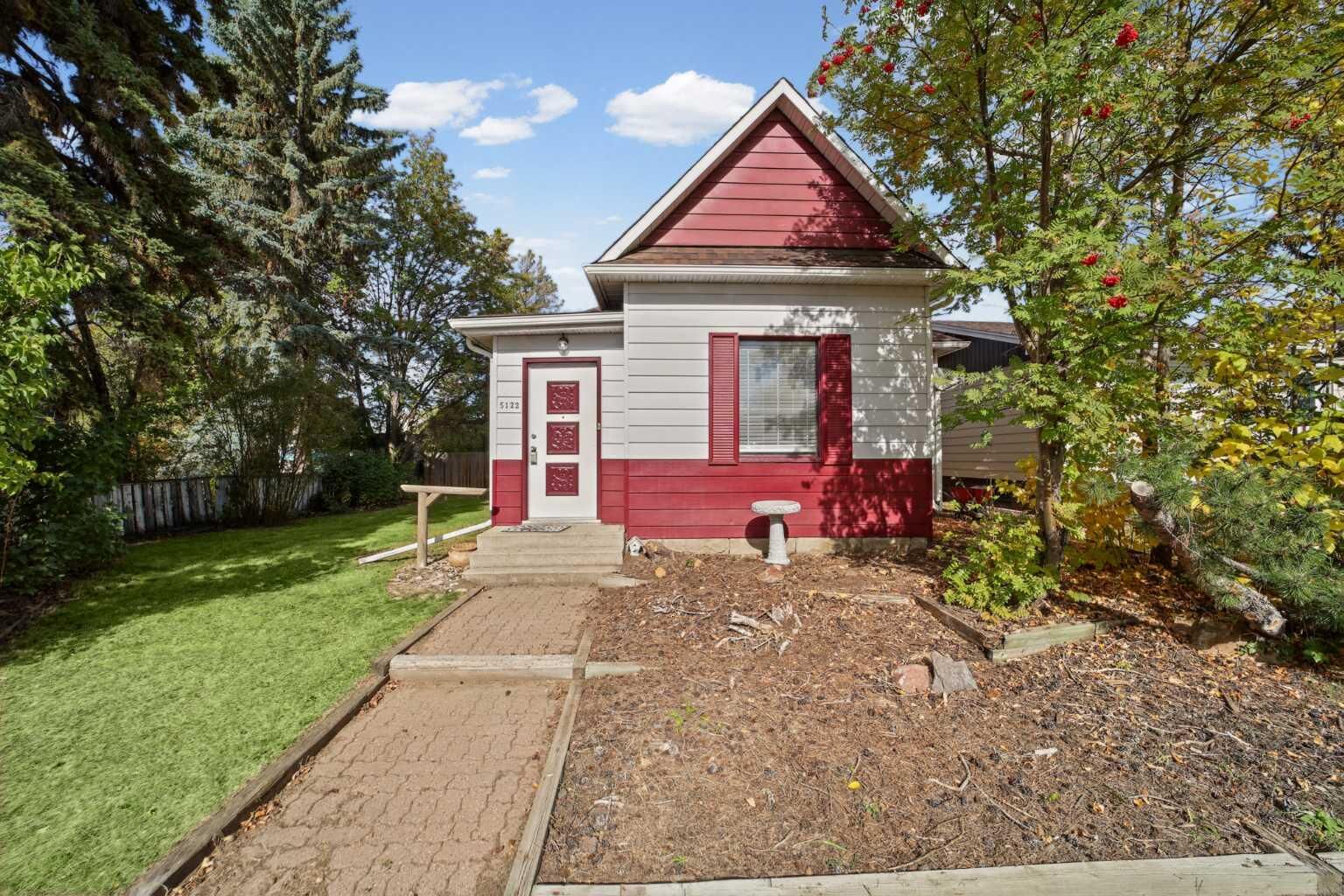 Property Photo:  5122 49 Street  AB T4H 1H4 