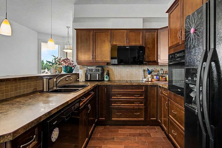 Property Photo:  26 Val Gardena View SW 542  AB T3H 5Z5 