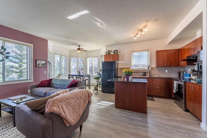 Property Photo:  8 Prestwick Pond Terrace SE 227  AB T2Z 4P3 