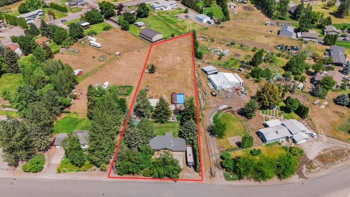 Property Photo:  16317 E 16th Ave  WA 99037 