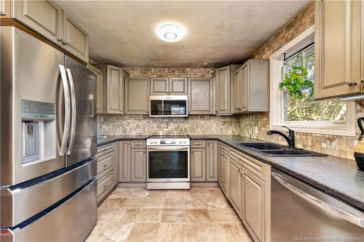 Property Photo:  83 Renfrew  NB E4Z 4S6 