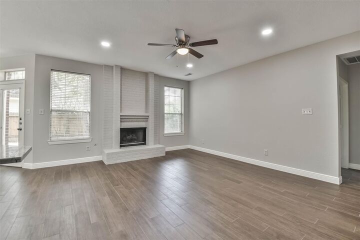 Property Photo: 15 Shinyrock Place TX 77381