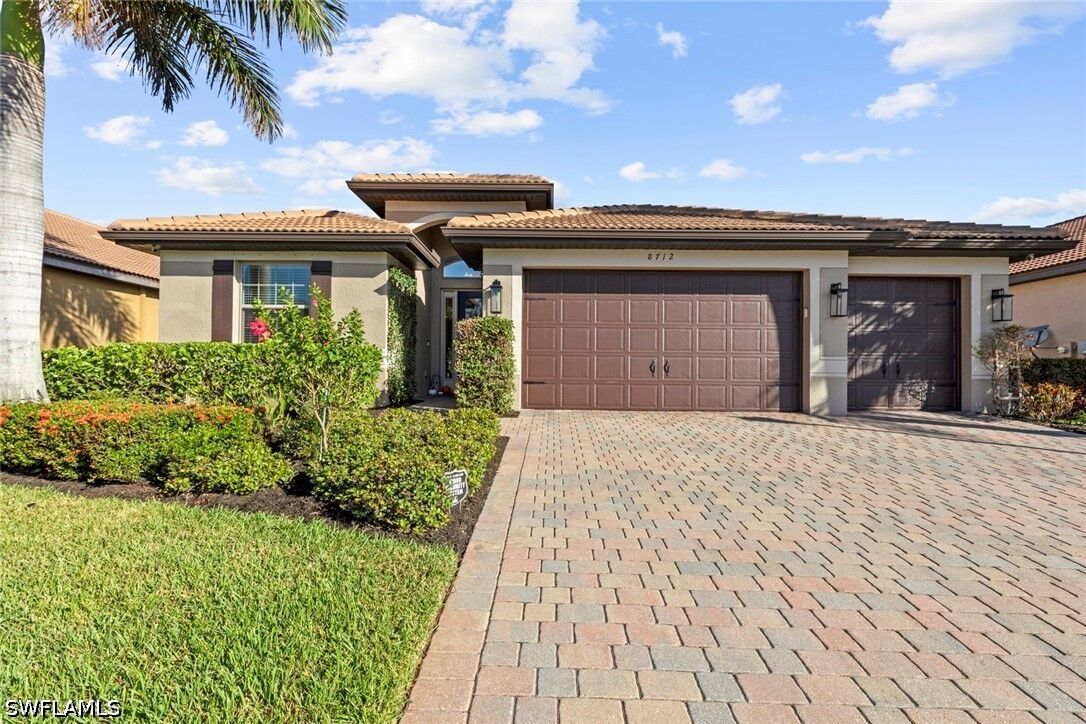Property Photo:  8712 Westwood Oaks Place  FL 33908 