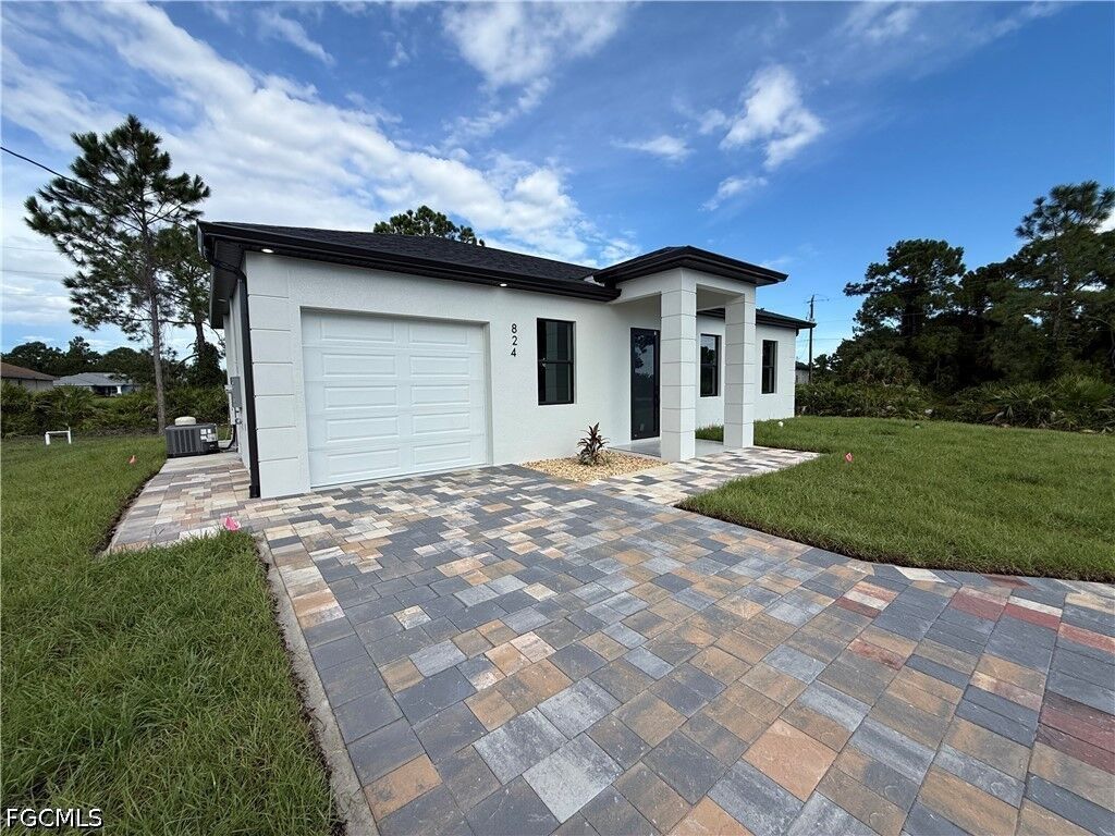 Property Photo:  824 Dawhert Avenue S  FL 33974 