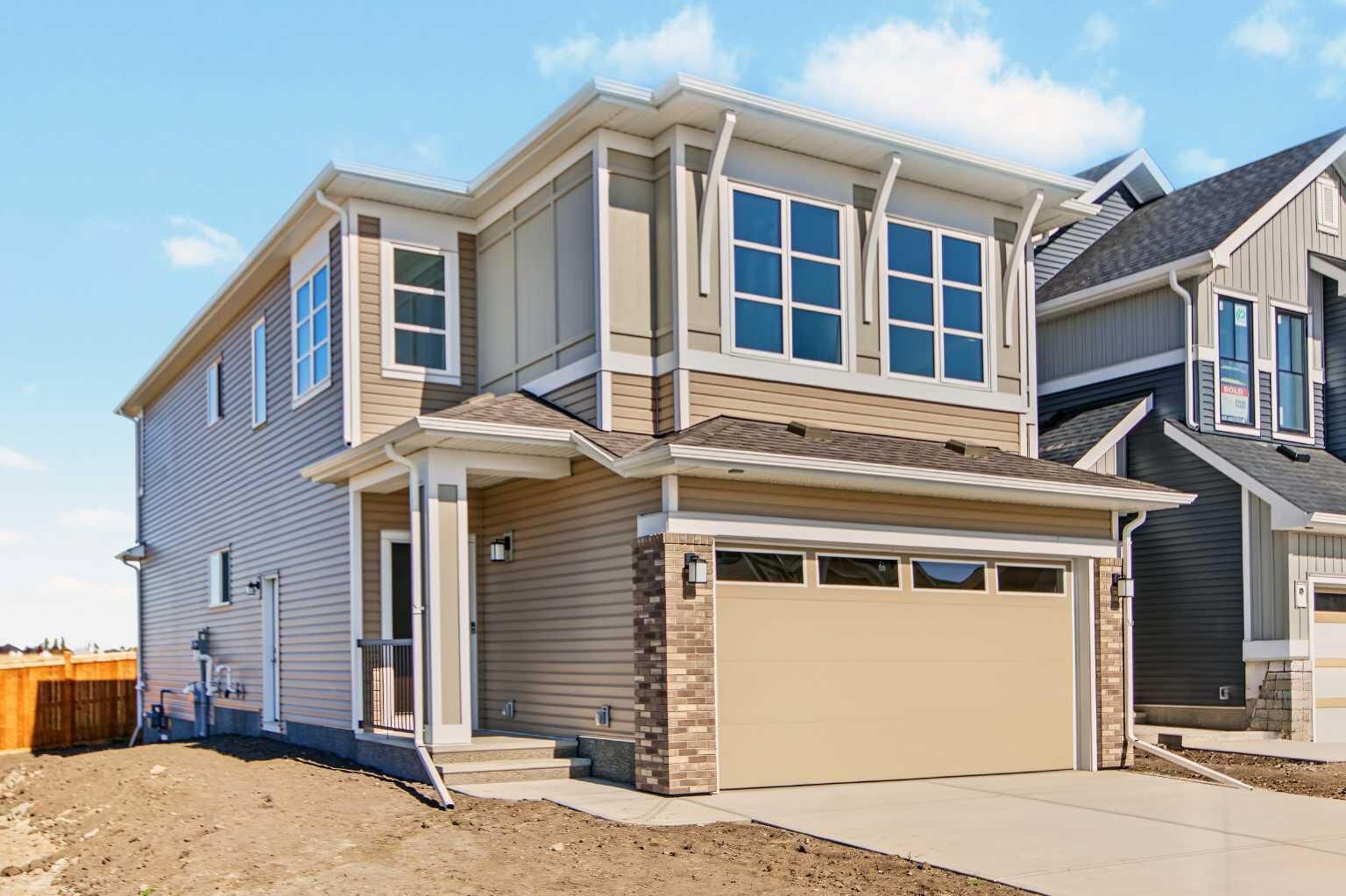 Property Photo:  138 Silver Spruce Road SW  AB T2X 6L3 