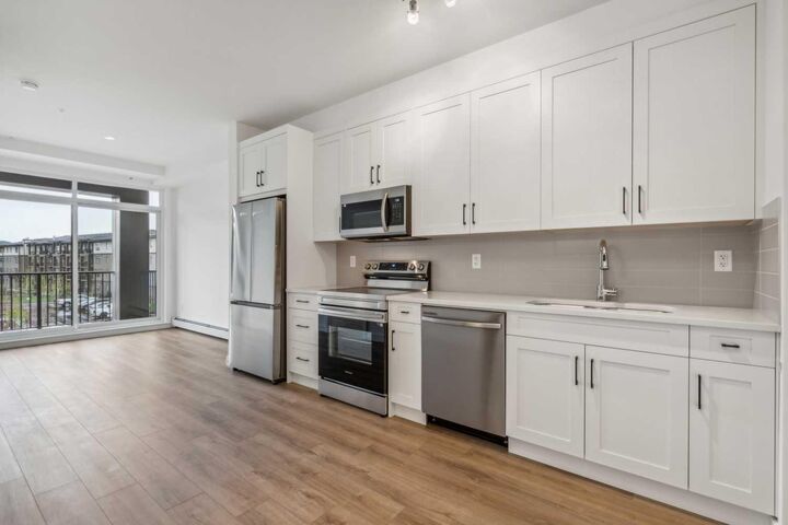 Property Photo:  14910 1 Street NW 1206  AB T2C 3G3 