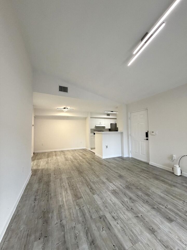 Property Photo:  4852 N State Road 7 207  FL 33073 