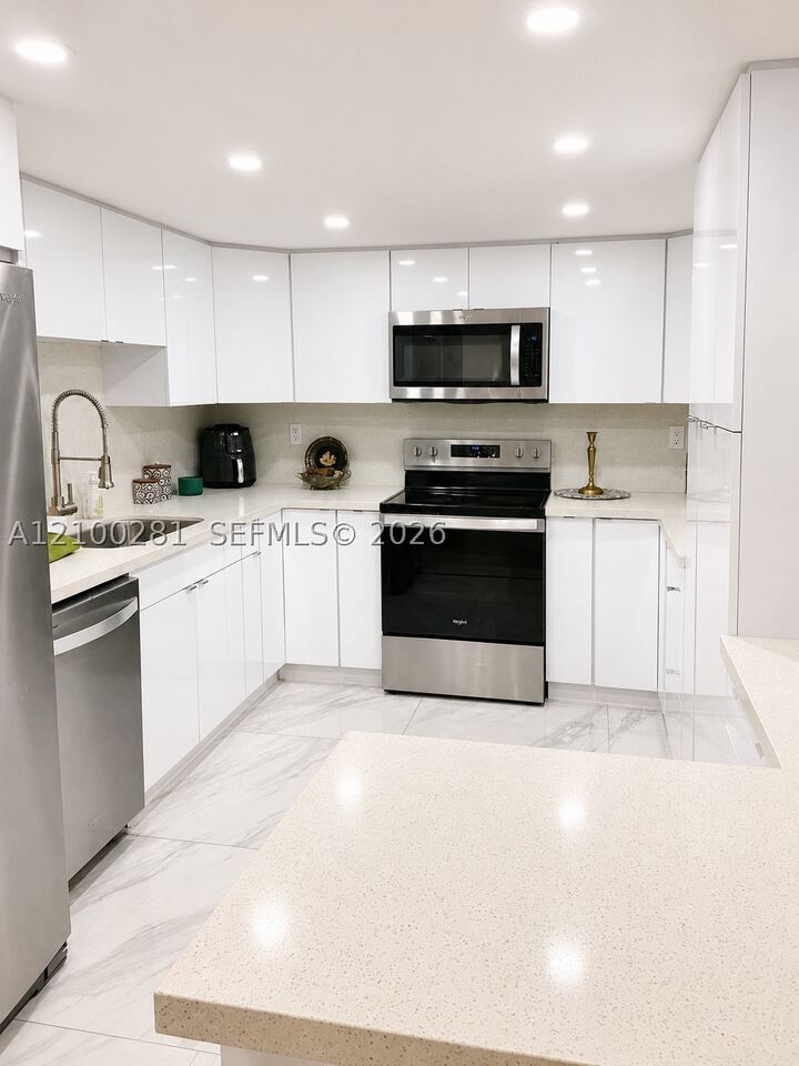 Property Photo: 9735 NW 52nd St 305 FL 33178