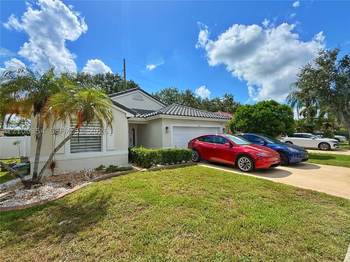 Property Photo:  2411 NW 184th Ter  FL 33029 