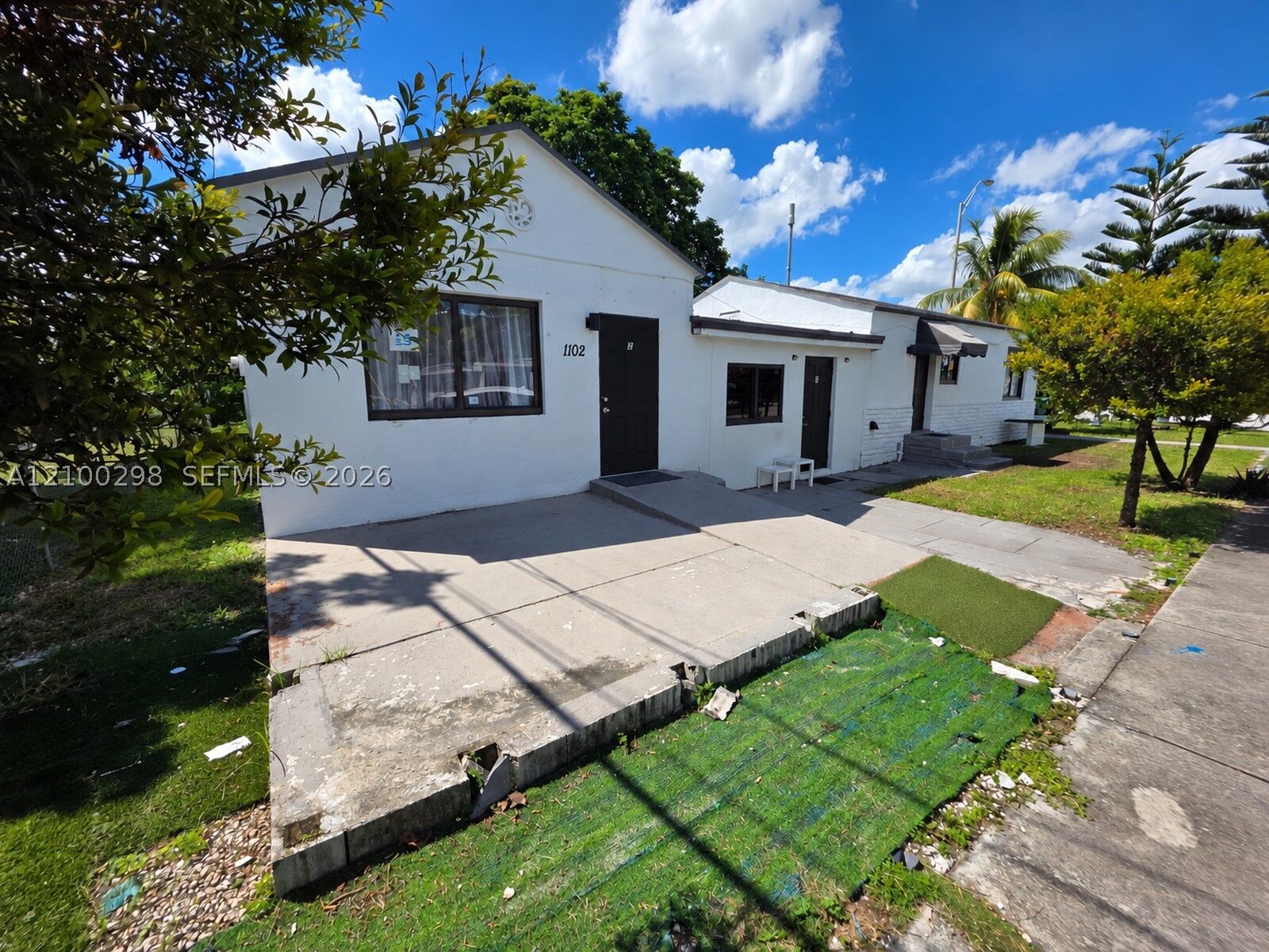 Property Photo: 1102 NW 103rd St FL 33150