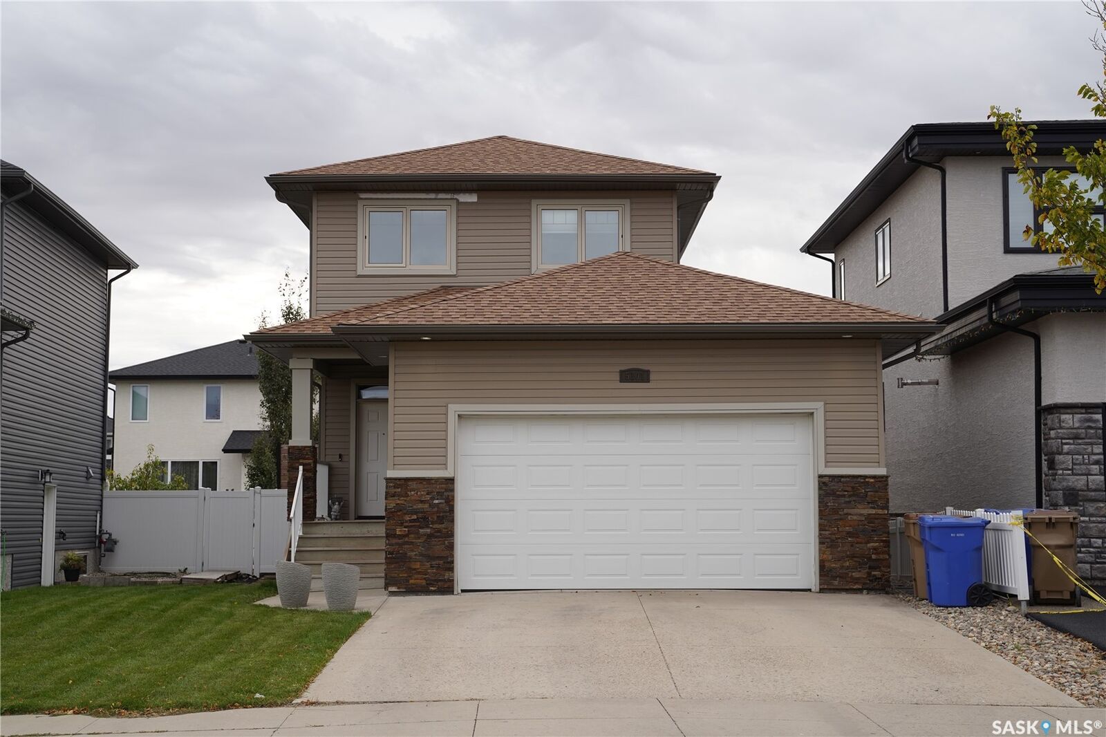 Property Photo:  5101 Tutor Way  SK S4W 0H4 