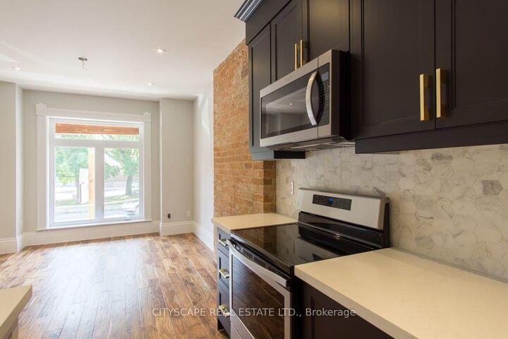 Property Photo:  936 Dundas Street E Main  ON M4M 1R3 