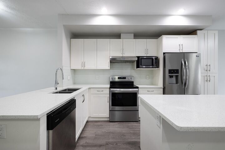 Property Photo: 14660 105A Avenue 27 BC V3R 5X9