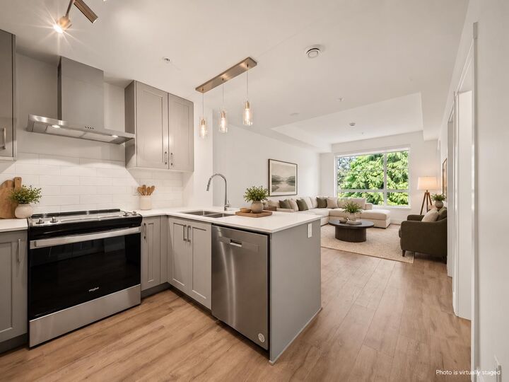 Property Photo:  6338 King George Boulevard 306  BC V3X 1E9 