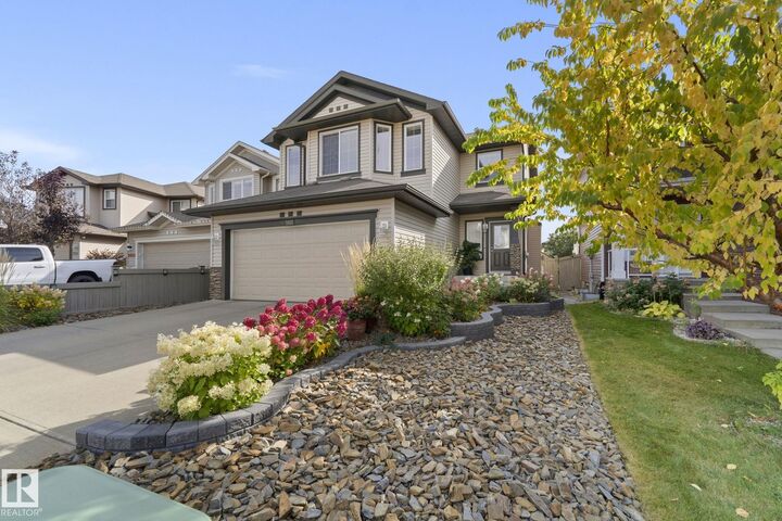 Property Photo:  5915 6 Avenue SW  AB T6X 0G4 