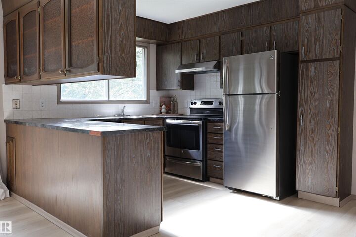 Property Photo:  3819 115 Avenue NW  AB T5W 0V2 