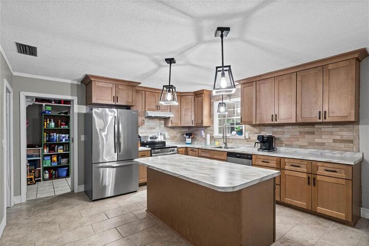 Property Photo:  6571 Sandra Drive  AL 36582 