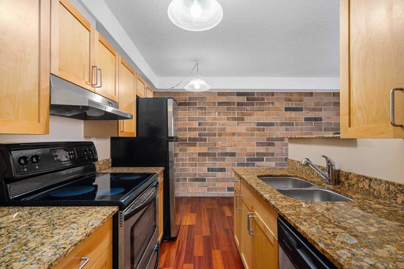 Property Photo:  315 9A Street NW #404  AB T2N 1T7 