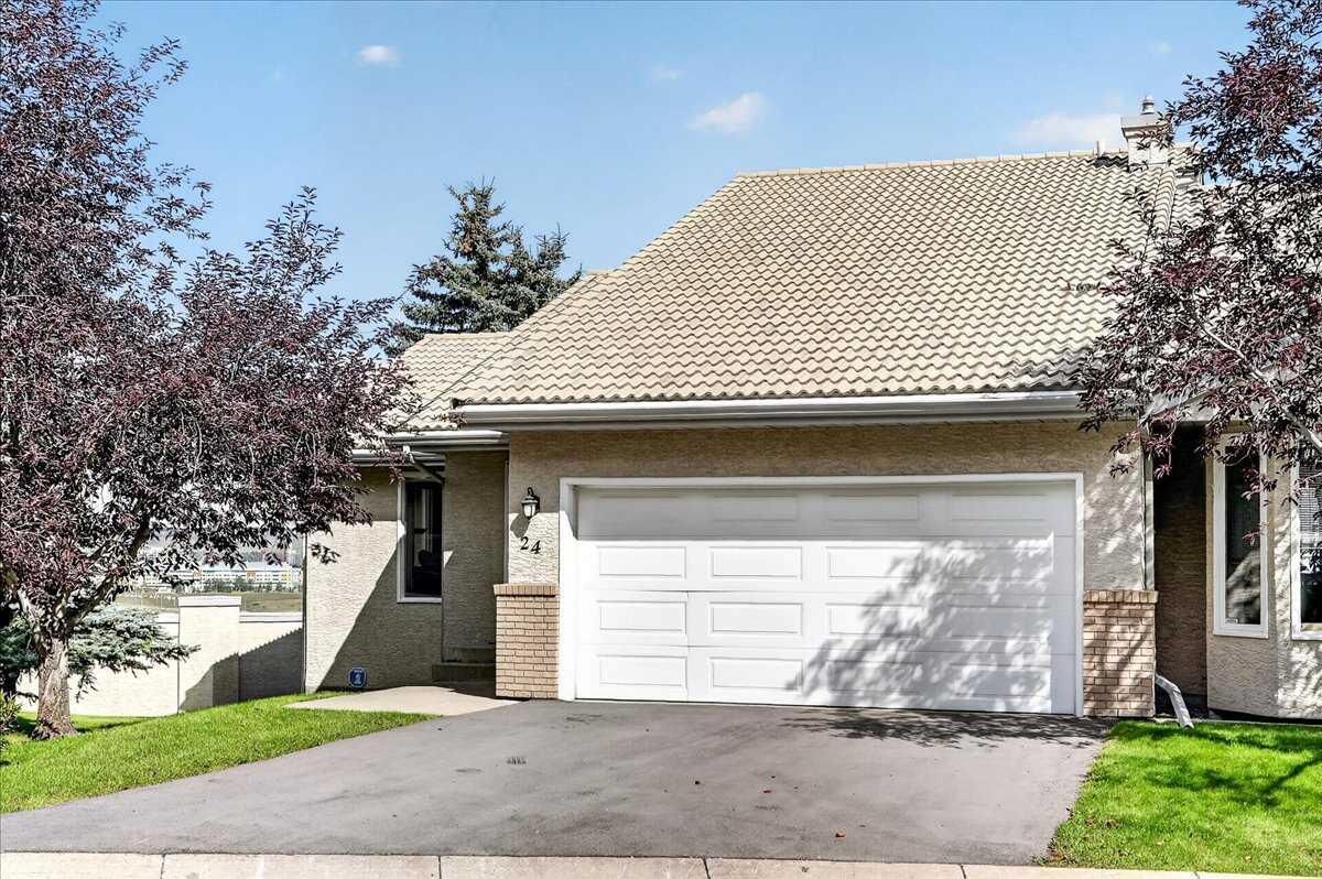 Property Photo:  5790 Patina Drive SW 24  AB T3H 2Y5 