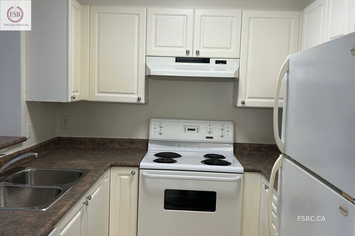 Property Photo:  9979 140 St  BC V3T 5W2 