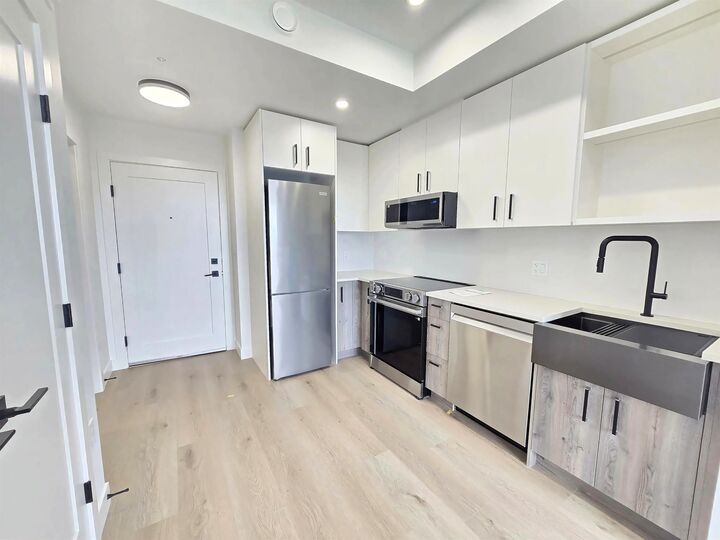 Property Photo:  10405 147 Street 414  BC V3R 5X4 