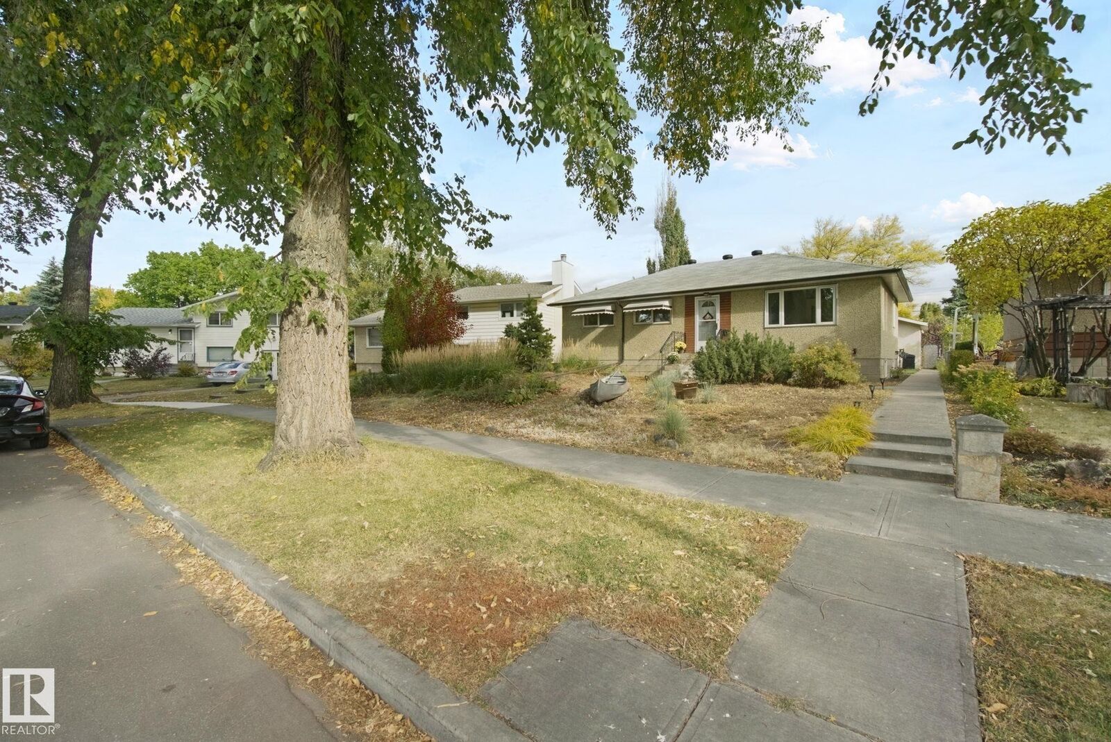 Property Photo:  11639 134 Street NW  AB T5M 1J3 