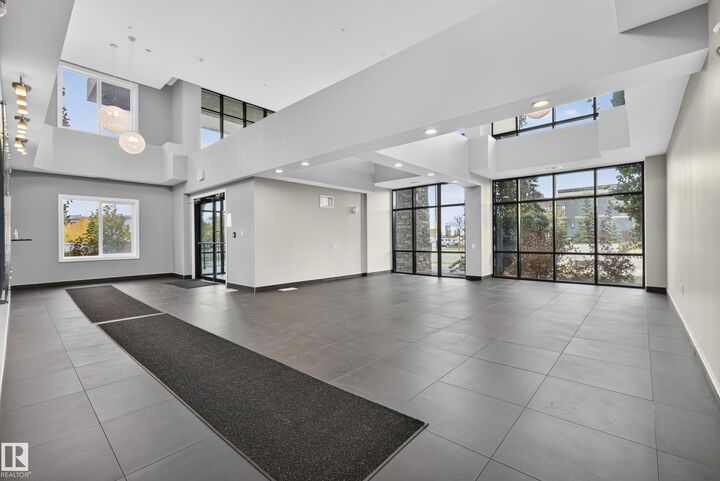 Property Photo: 1230 Windermere Way SW 505 AB T6W 2J3
