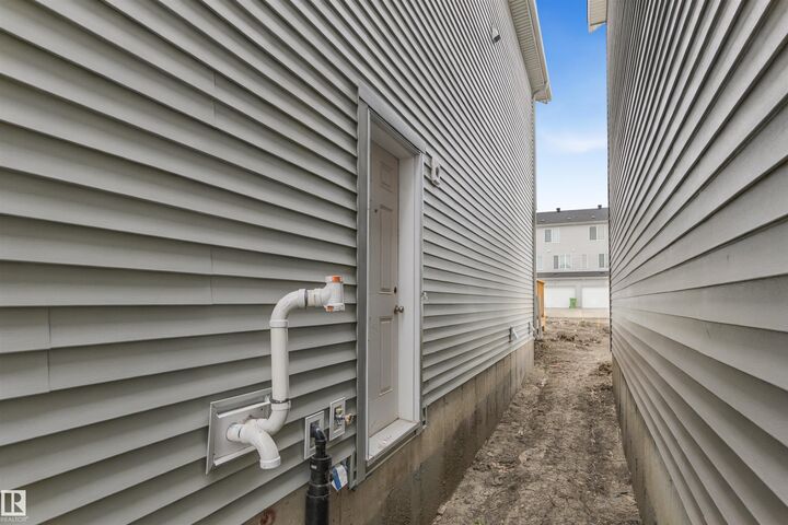 Property Photo:  307 Elliott Wynd  AB T8L 3X6 