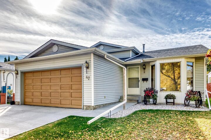 Property Photo:  47 Deerbourne Drive  AB T8N 4R2 
