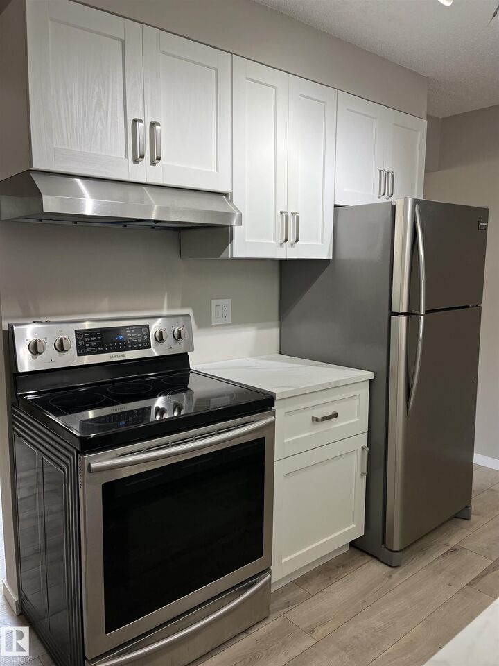 Property Photo:  14130 80 Street NW 10  AB T5C 1L6 