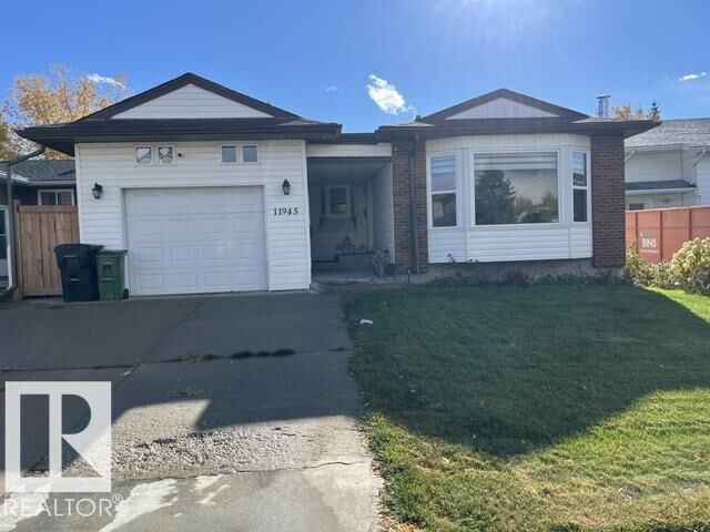 Property Photo:  11945 138 Avenue NW  AB T5X 4K1 