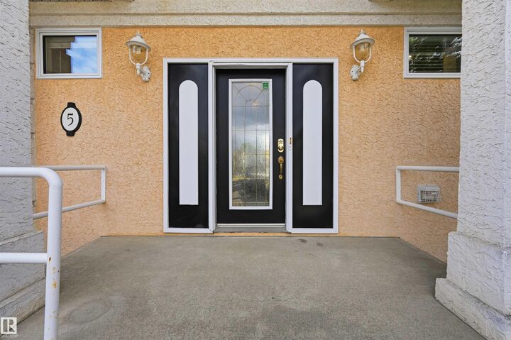 Property Photo:  11809 9B Avenue NW 5  AB T6J 7B6 