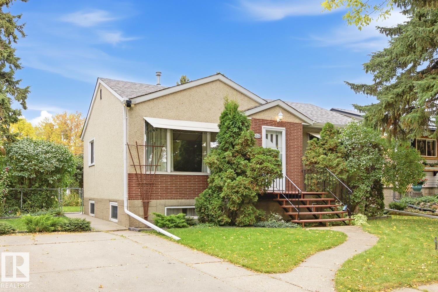 Property Photo:  4218 111 Avenue NW  AB T5W 0K2 