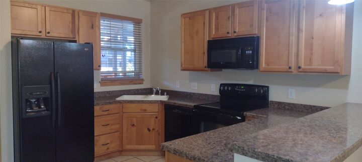 Property Photo:  4100 Mullan Road 210  MT 59808 