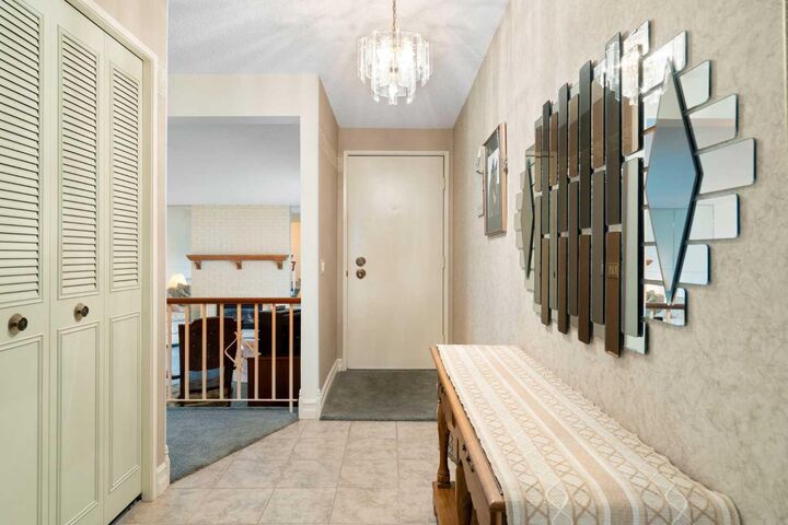 Property Photo:  6807 Silverdale Road NW  AB T3B 3N3 