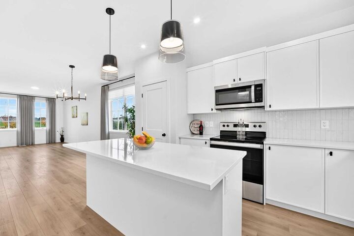 Property Photo:  85 Heirloom Way SE  AB T3S 0H3 