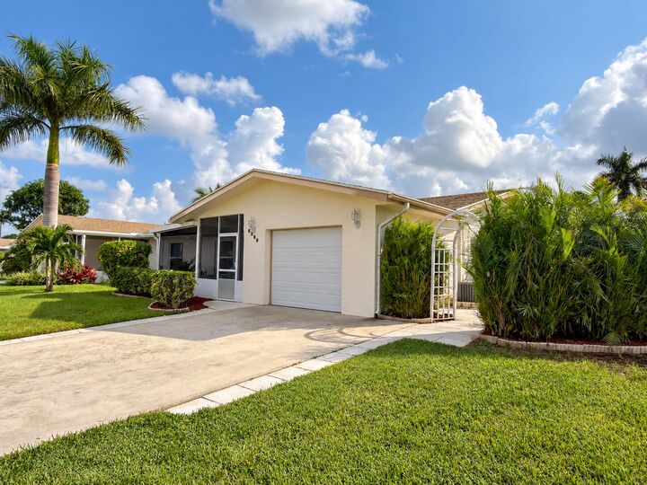 Property Photo:  6309 Dusenburg Road  FL 33484 