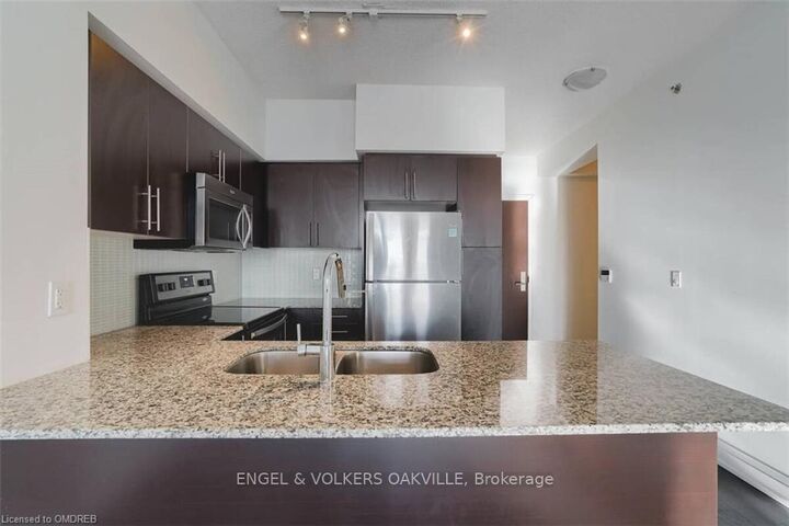 Property Photo: 65 Speers Road 710 ON L6K 0J1