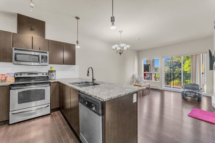 Property Photo:  9655 King George Boulevard 409  BC V3T 0C7 